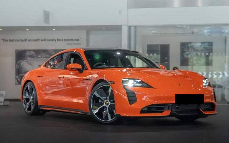 Porsche store taycan orange